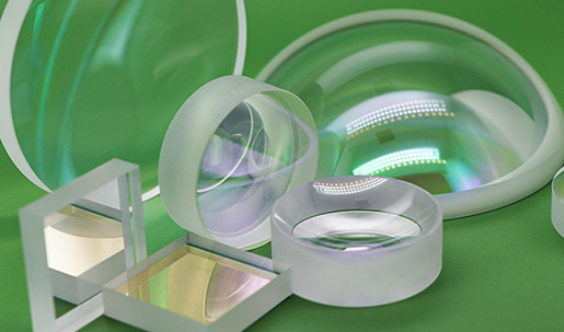 Coated achromatic lenses