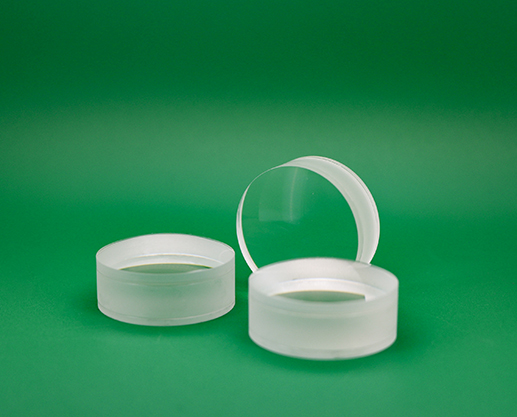 Applications of MgF2 Coated Achromatic Lenses in Laser Systems